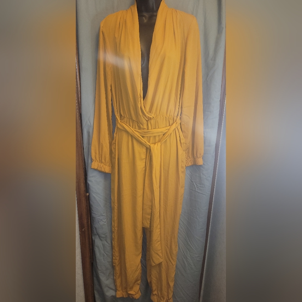 Mustard yellow one-piece jumper. Size XL. NWT.